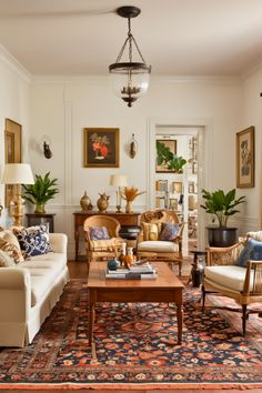 a living room filled with furniture and decor