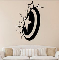 the captain's shield wall decal is shown in this living room