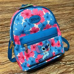 Brand: Disney Size: One Size Color: Blue Condition: Brand New With Original Tags Same Day Shipping Via Usps Disney Stitch Bag Blue Disney Stitch Mini Backpack Stitch Backpack Cute Blue Backpack For Travel, Disney Style Bags With Zipper For Back To School, Blue Backpack For Disney Fan Events, Cute Blue Bags For Back To School, Character Style Blue Backpack For Back To School, Disney Bags For Daily Use And Back To School, Cute Blue Travel Backpack, Fun Blue Backpack For Travel, Cute Blue Bag For Back To School