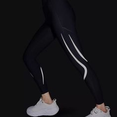 Light up the night in the Sweaty Betty Zero Gravity 7/8 Illuminate Run Legging. These compressive workout tights feature ultra-reflective details that keep us visible on dark or dreary runs, and they offer additional compression similar to kinesiology tape for maximum support. Speaking of support, these leggings feature Sweaty Betty's sculpting shape. High Stretch Reflective Activewear For Gym, High Stretch Activewear With Reflective Details For Gym, High Stretch Gym Activewear With Reflective Details, Stretch Activewear With Reflective Details For Gym, Athleisure Activewear With High Stretch And Reflective Details, Stretch Sporty Activewear With Reflective Details, Sporty Stretch Activewear With Reflective Details, High Stretch Reflective Activewear For Training, Stretch Activewear With Reflective Details