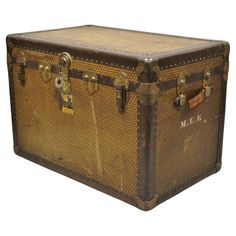 Antique Belber Traveling Goods Monogram Louis Style Hard Case Steamer Trunk. Item features a unique geometric monogram print throughout similar to LV, metal hardware, leather handles, lift out insert, original label, working lock and key, very nice antique item, quality American craftsmanship. Circa Early 20th Century. Measurements: 22.5" H x 32.5" W x 20.25" D. Trunk Boxes, Leather Trunk, Travel Trunk, Steamer Trunk, Leather Frames, Bespoke Interiors, Leather Box, Monogram Prints, Metal Tins