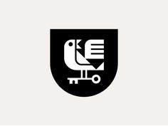 a black and white logo with an image of a bird in the middle of it