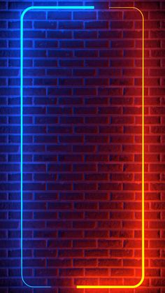 a neon frame on a brick wall with a red and blue light in the corner