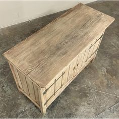 an old wooden cabinet sitting on the floor