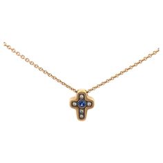 18K Yellow Gold "Cross" pendant. The pendant has 1 Sapphire. 15ct and 5 Diamonds .05ctw. 18" 1.5mm Chain Included 6.4 grams Luxury Cross Necklace In Fine Jewelry Style, Fine Jewelry 14k Gold Cross Pendant Necklace, Luxury Yellow Gold Fine Jewelry Cross Necklace, Luxury Gold Cross Pendant Necklace, Yellow Gold Cross Pendant Necklace With Gemstone, Luxury Yellow Gold Cross Pendant Jewelry, Alex Sepkus, Gold Cross Pendant, Minimal Jewelry