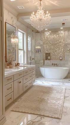 a luxurious bathroom with chandelier and marble floors