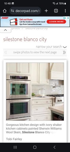 an image of a kitchen with white cabinets and stainless steel appliances on the front page