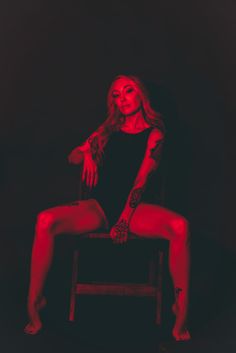 Blonde woman with tattoos in red and black photograph with black bodysuit. Boudoir posing with high contrast. Gel Photography, Neon Photoshoot, Headshots Portraits, Tattoo Photography, Photoshoot Concept, Photography Poses Women