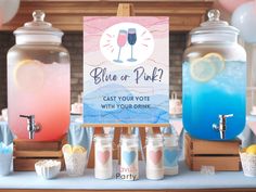 blue and pink drinks are on display at a party