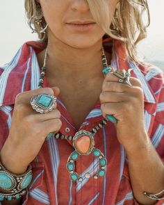 Details: Eye catching silver detailing on this turquoise stone ring makes this your go to accessory Adjustable band Nickel free. Read more → Natural stones are unique and may vary in size, color, and shape Dimensions: Length: 1.5-inch Southwestern Turquoise Ring With Natural Stones, Adjustable Southwestern Turquoise Necklace, Turquoise Stones Necklace, Festival Jewelry With Gemstones, Southwestern Adjustable Jewelry With Stones, Adjustable Western Turquoise Necklace, Adjustable Western Style Turquoise Necklace, Western Style Nickel Free Turquoise Jewelry, Adjustable Southwestern Jewelry With Large Stone