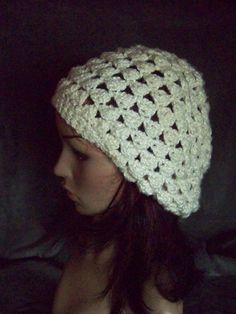 This hat was crocheted  with a yarn that is 12% acrylic, 2% polyester and 86% bamboo.  The hats color is call linen.  It has a relaxed circumference of 20 inches and a stretched circumference of 22 inches.  This hat is soft, cozy and warm just in time for the cup coming winter months.  I would suggest it to be washed by hand and lay flat to dry. If you have any question please contact me. Shipping: I will ship outside of the continental United States. Just email me your location and I will gladl White Winter Hat, Crochet White, Bamboo Yarn, Feb 5, Skull Cap Beanie, Vintage Avon, Pretty Gift, White Crochet, The Continental