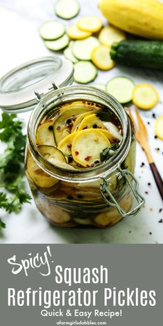 pickled squash in a glass jar on a table with sliced cucumbers and parsley