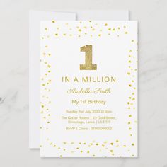 a white and gold 1st birthday card with the number one on it's front