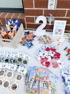 the table is set up for two children's birthday party