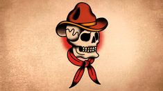 a skull wearing a hat and scarf with a red ribbon around it's neck