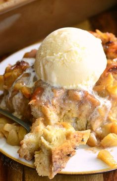 a close up of a plate of food with an ice cream on top of it