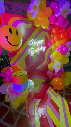 a birthday party with balloons and decorations