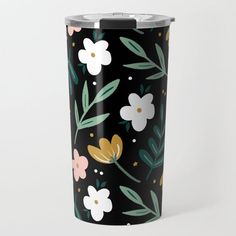 a black floral tumbler with white and pink flowers on it