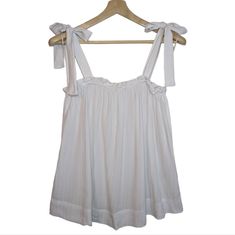 Nwt | H&M White Crop Top W|Bow Accent Straps - Straps Are Not Adjustable But Can Be Re-Tied. Size | Medium Overall Length | 26" Pit To Pit | 16" Waist | 27" Condition | Preowned, Never Worn. Nwt. White Tops With Adjustable Straps For Daywear, H&m Tops For Summer Loungewear, White H&m Tops For The Beach, H&m White Beach Top, White H&m Beach Top, H&m Summer Loungewear Tops, White H&m Tops For Vacation, H&m White Tops For Vacation, White H&m Tops For Daywear