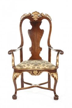 an antique wooden chair with floral upholstered seat and arm rests against a white background