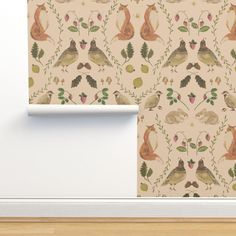 the wall paper has foxes and leaves on it