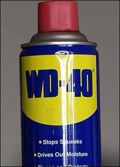 a can of wd - 40 sits on a table