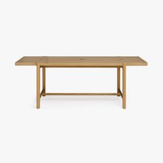 a wooden table on a white background with no one around the table to see it