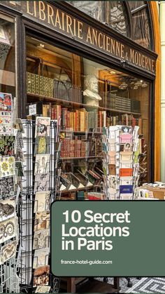 the front window of a book store with lots of books on display in paris, france