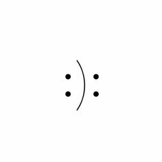 a black and white photo of an upside down smiley face with four dots on it