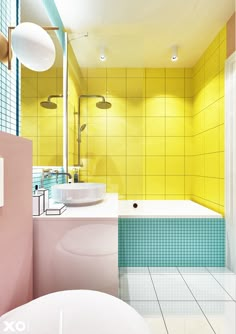 a bathroom with yellow and blue tiles on the walls, white sink and bathtub