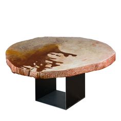 a table that has some kind of animal on it's side and is made out of wood