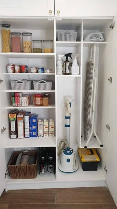 an organized pantry with lots of items in the shelves and on top of each other