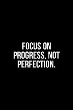 a black and white photo with the words focus on progress, not perfection