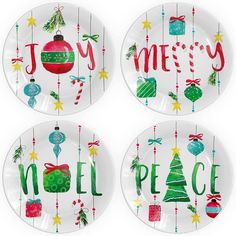 three plates decorated with christmas decorations and the words merry, noell, and bauble