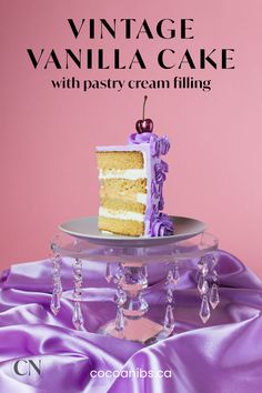 a piece of cake sitting on top of a plate next to a purple table cloth