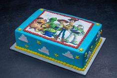 a toy story themed birthday cake on a table