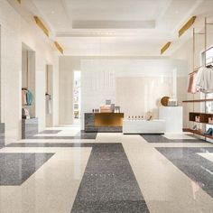 an elegant bathroom with marble floors and gold accents on the walls, along with shelving