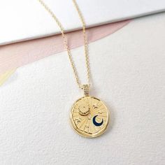 DescriptionThe Sun and Moon Pendant Necklace features: Pendant with sun, moon and stars Stone insets Fine and elegant Size18" chain3/4" pendant Material18k gold plated Sun And Moon Pendant, Wanderlust And Co, Sun Moon And Stars, The Sun And Moon, Moon Pendant Necklace, Wear Necklaces, Moon Jewelry, Moon And Stars, Navy Gold