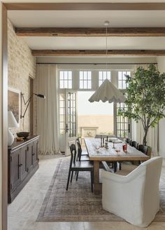 the dining room is clean and ready for us to eat dinner on it's own table