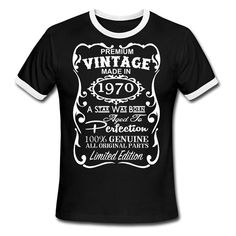 an old fashioned t - shirt with the words vintage made in 1971 and it's white