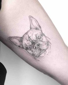 a dog's head is shown on the arm