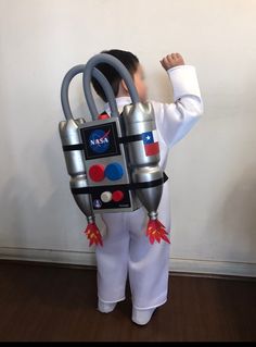 a young boy dressed up as a spaceman