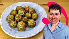 a white plate topped with meatballs next to a man's face and an empty plate