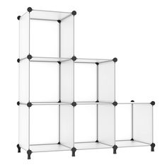 three glass shelves with black handles on each side and one shelf holding four different items