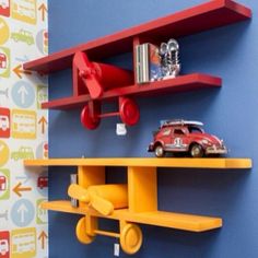 a toy car is sitting on top of a shelf in a child's room