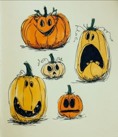 an image of pumpkins with faces drawn on them