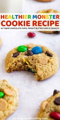 Healthier Monster Cookies are chewy, melty whole wheat cookies that are low in fat and under 200 calories. Packed with M&M's, chocolate chips, peanut butter chips, and peanuts.