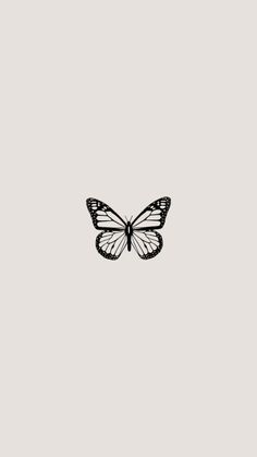 a black and white butterfly on a gray background