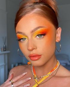 Luau Makeup Ideas Hawaii, Orange Make Up Looks Creative, Orange And Yellow Makeup Looks, Bird Inspired Makeup, Orange Festival Makeup, Hawaii Makeup Look, Yellow Orange Makeup, Hawaiian Makeup Look, Fire Eye Makeup