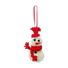 a knitted snowman ornament hanging from a red ribbon on a white background